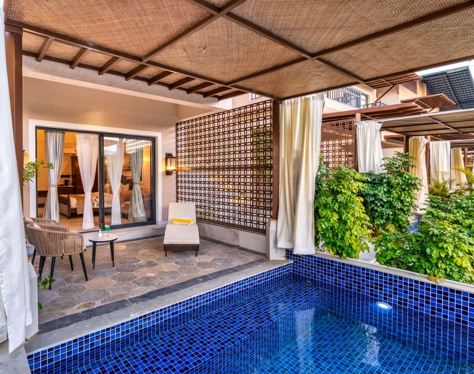 Private plunge pool patio at Amrutham Bagh